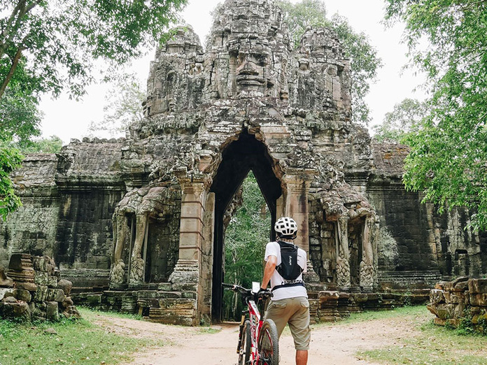 Rien de mieux qu'un VTT pour explorer le Parc Archéologique d'Angkor Copyright © Easia Travel