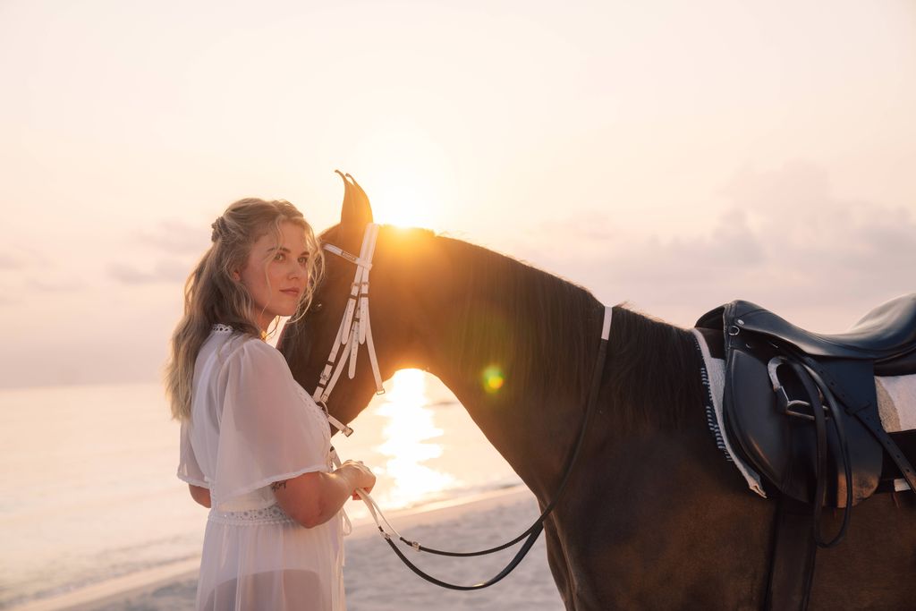 A cheval sur la plage (©Sun Siyam Resorts)